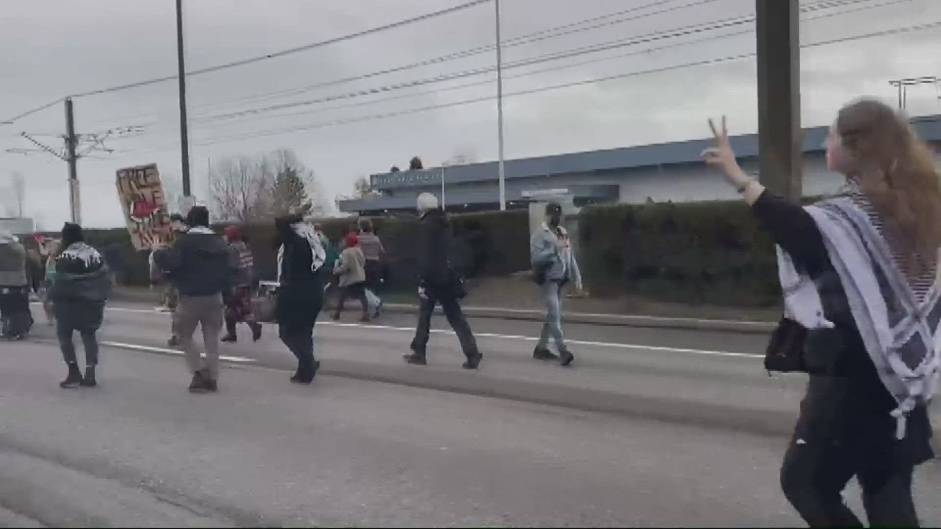 Portland police say the protest took place on Airport Way west of 82nd
